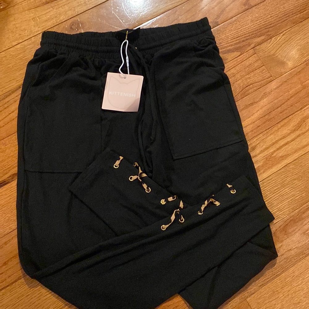 Nwt small black lightweight kittenish sweats with leopard print detail at bottom